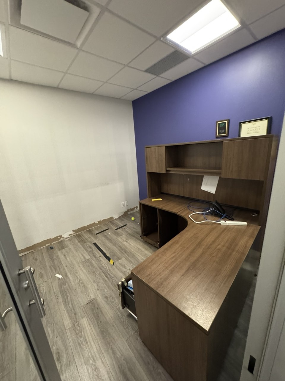 Glue-Down Vinyl Flooring Installation Across Multiple Offices — Flooring project by EverPeak Elite